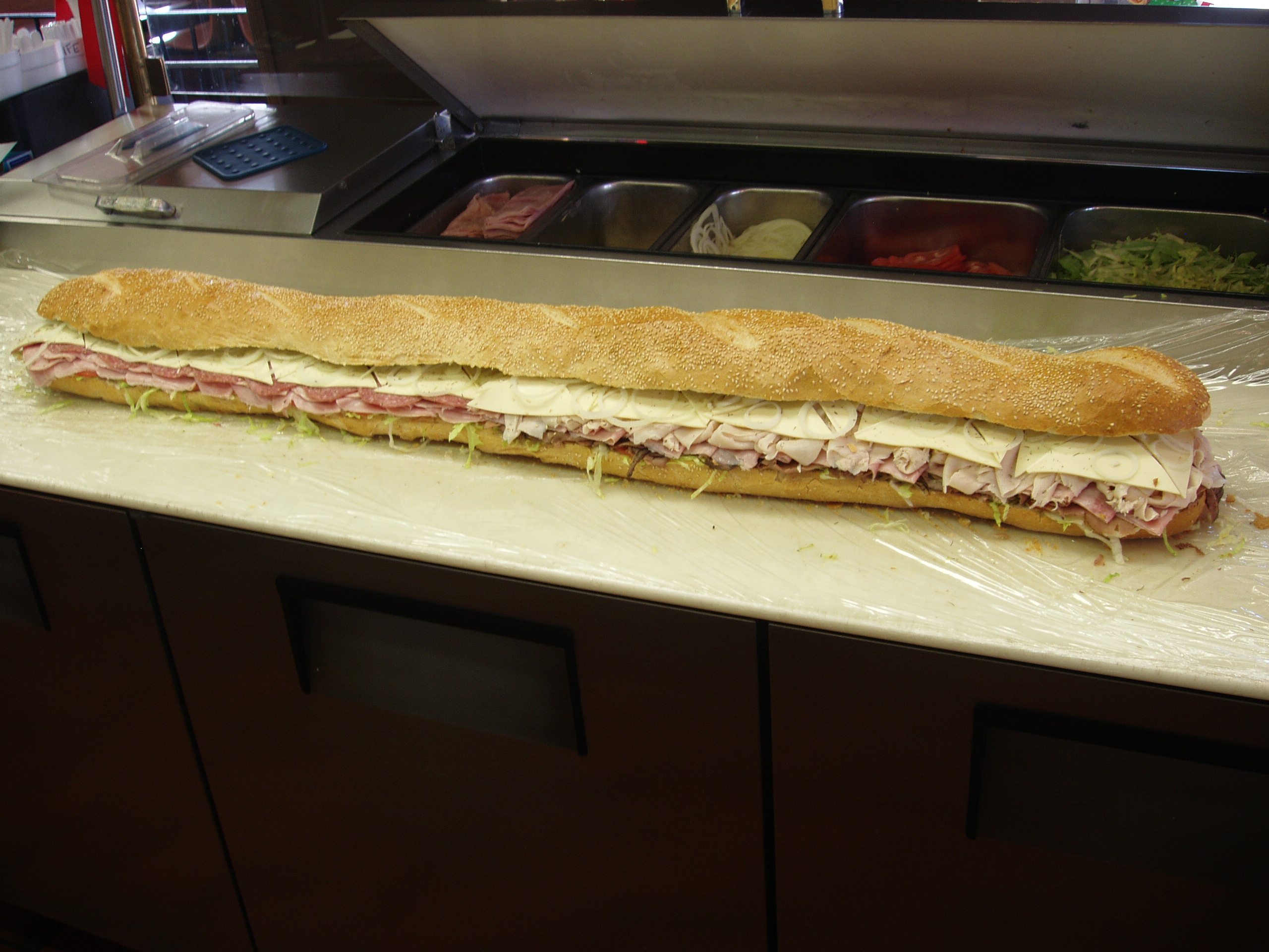A six-foot Submarine City sub sandwich prepared for catering.
