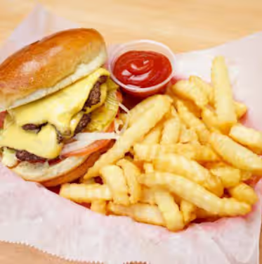 A cheeseburger with crinkle fries from Submarine City.